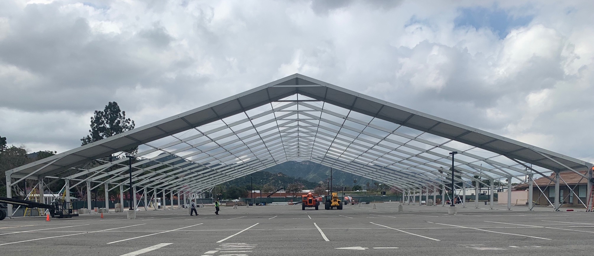 Panoramic view of temporary manufacturing tent structure with wide clearspan interior for production operations